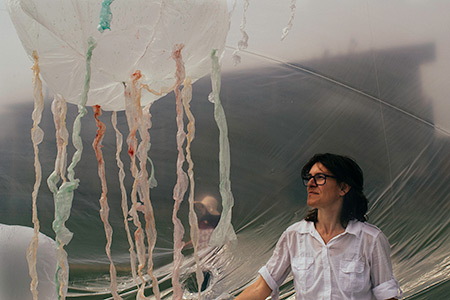 Artist-in-residence Olga Diego stands inside her