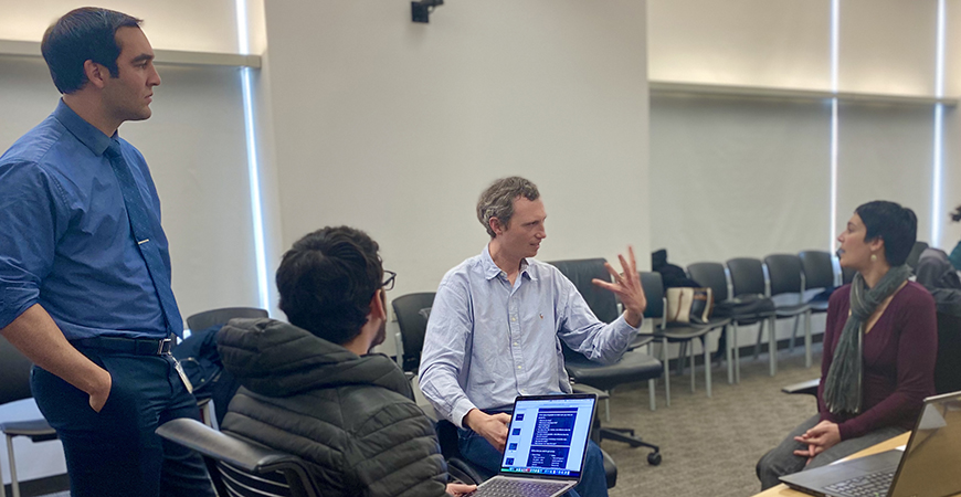 Fellows prepare to undergo mock interviews where they will present their research in a way the general public can understand. 